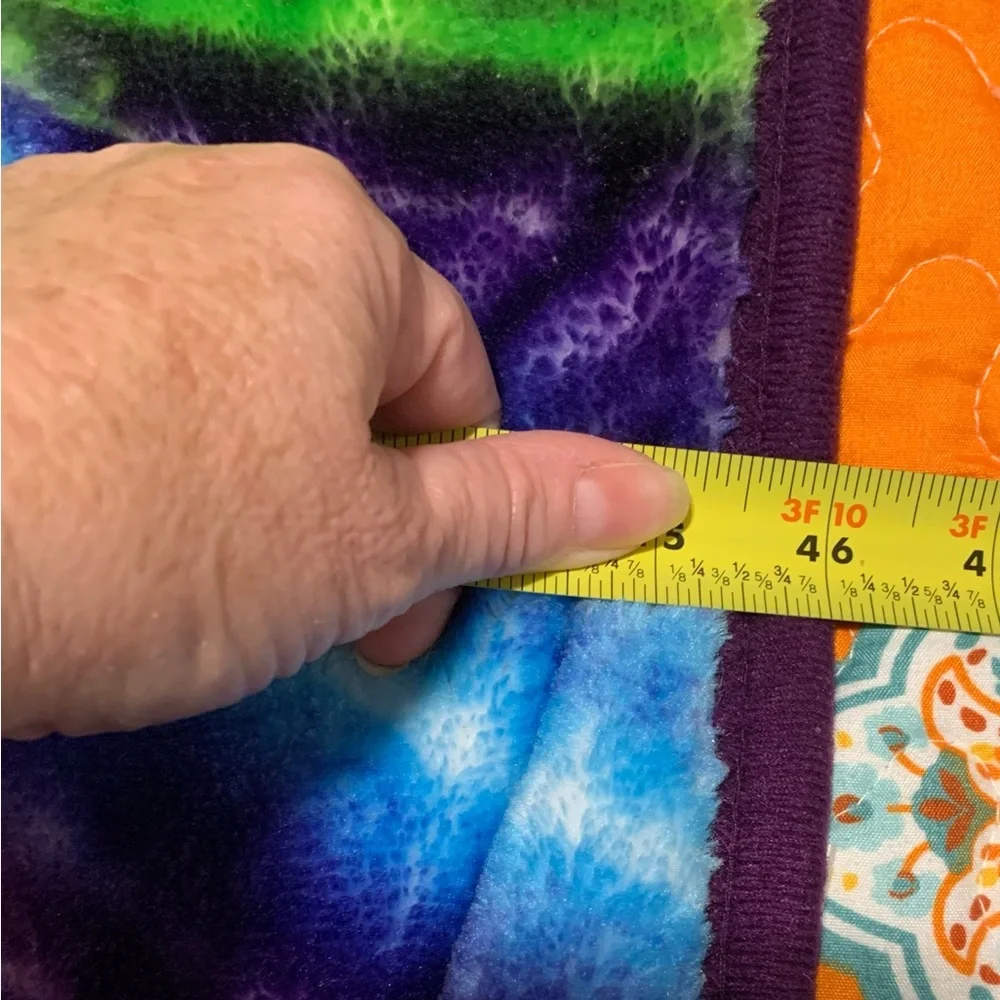 Throw blanket with cat on it